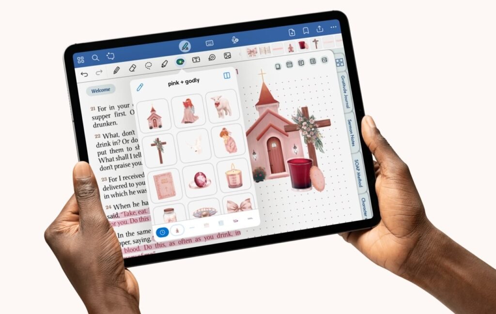 hands holding a tablet with a picture of a church